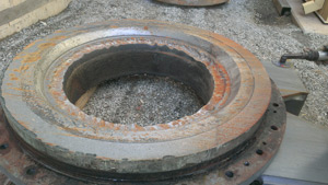 Wear plates were damaged by severe abrasion from impure water.